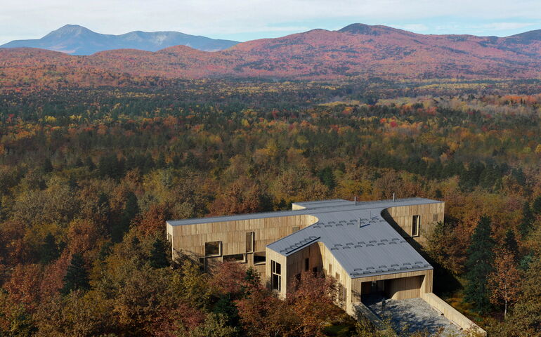 aerial of building and woods
