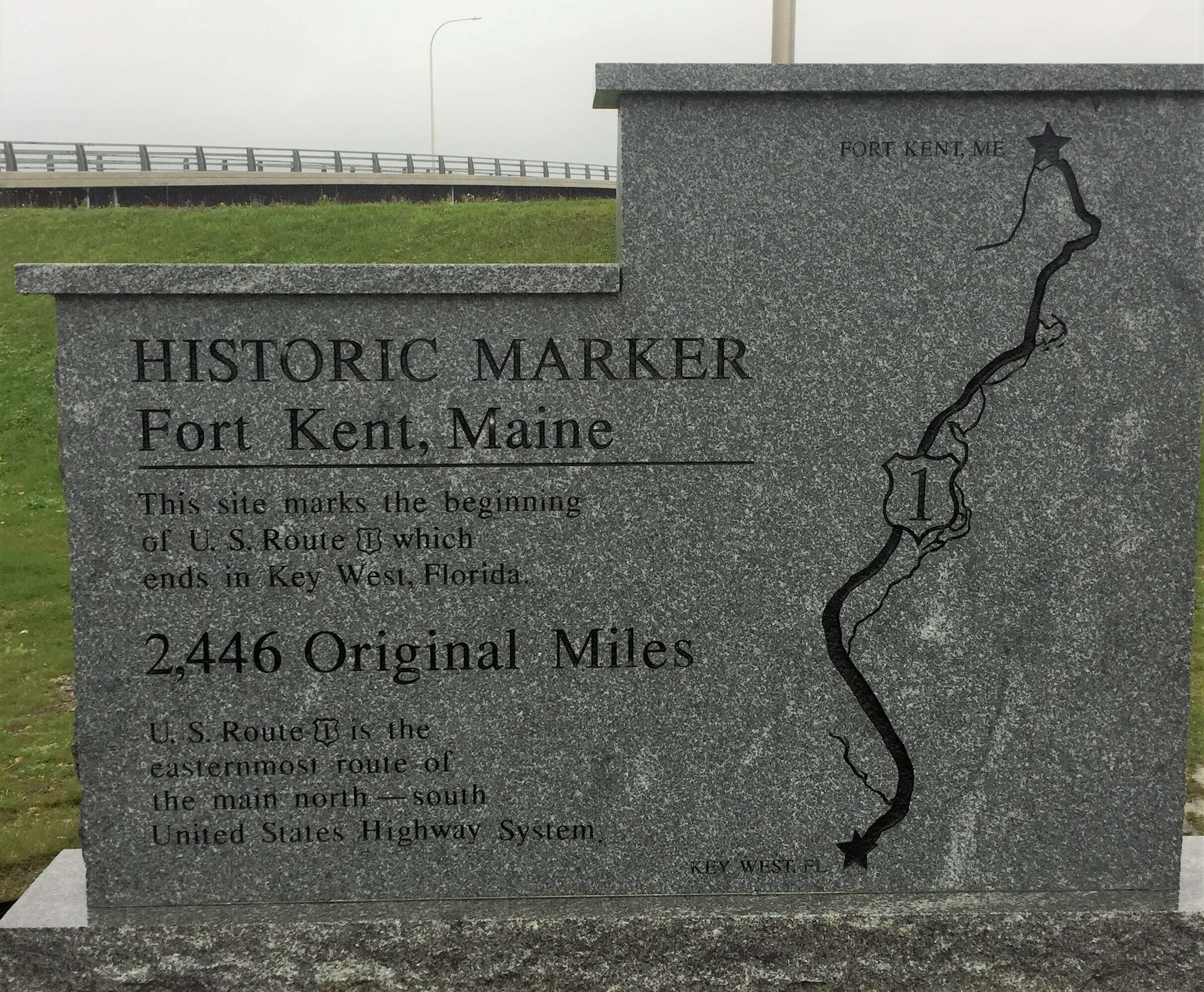 Stone tablet with bridge in backgroud