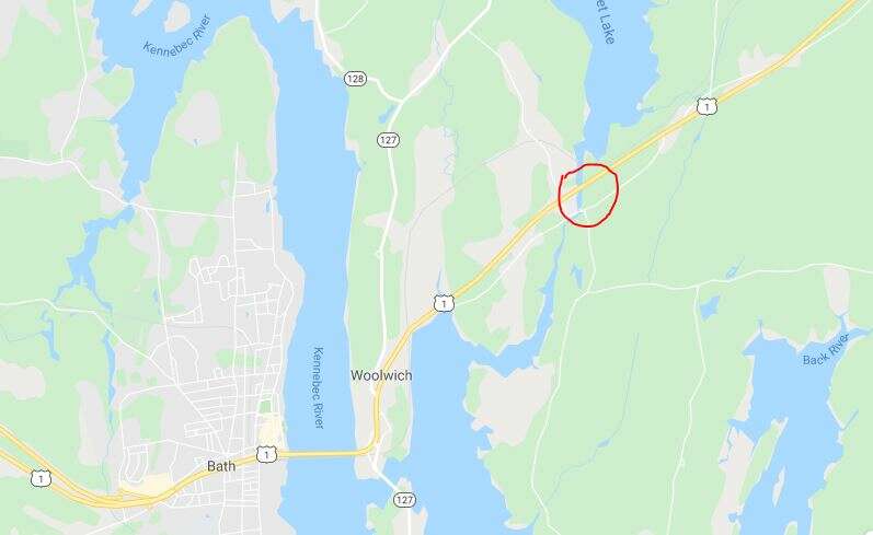 A map showing U.S. Route 1 through Woolwich, Maine, with a circle over a bridge that crosses a small river and railroad track.