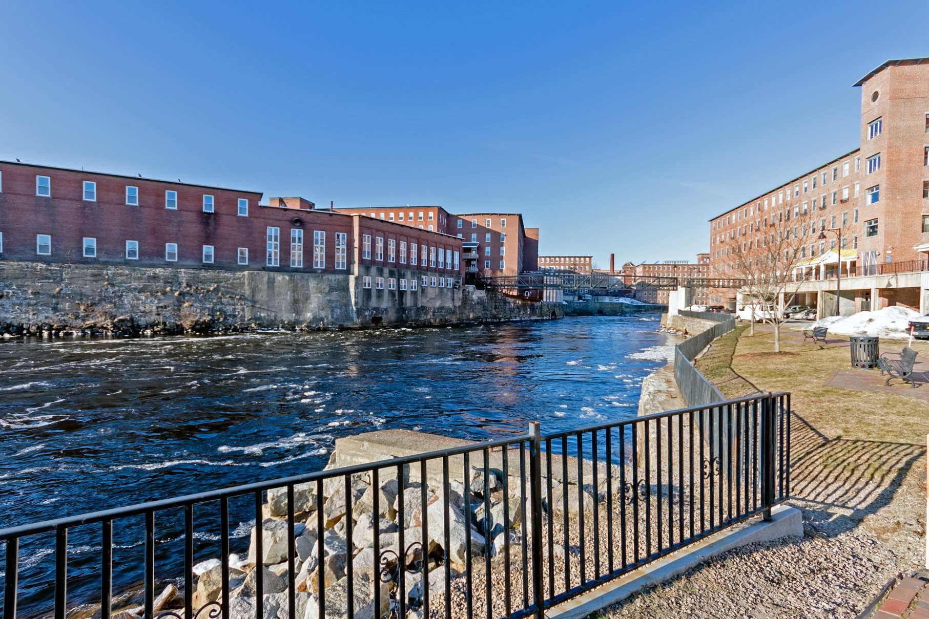 A mill complex with a river running through it