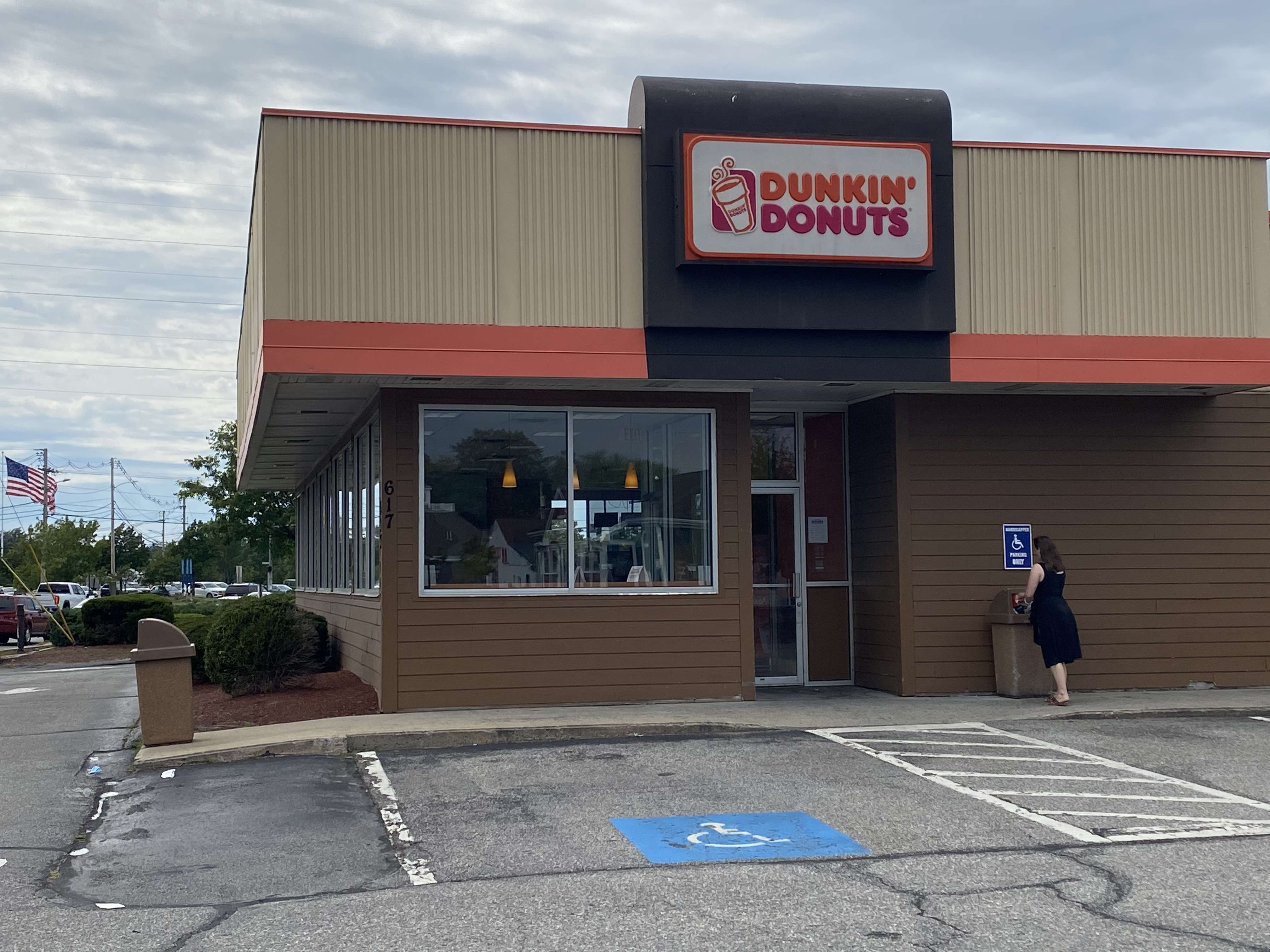 Dunkin' Donuts in South Portland, exterior building photo from the parking lot.