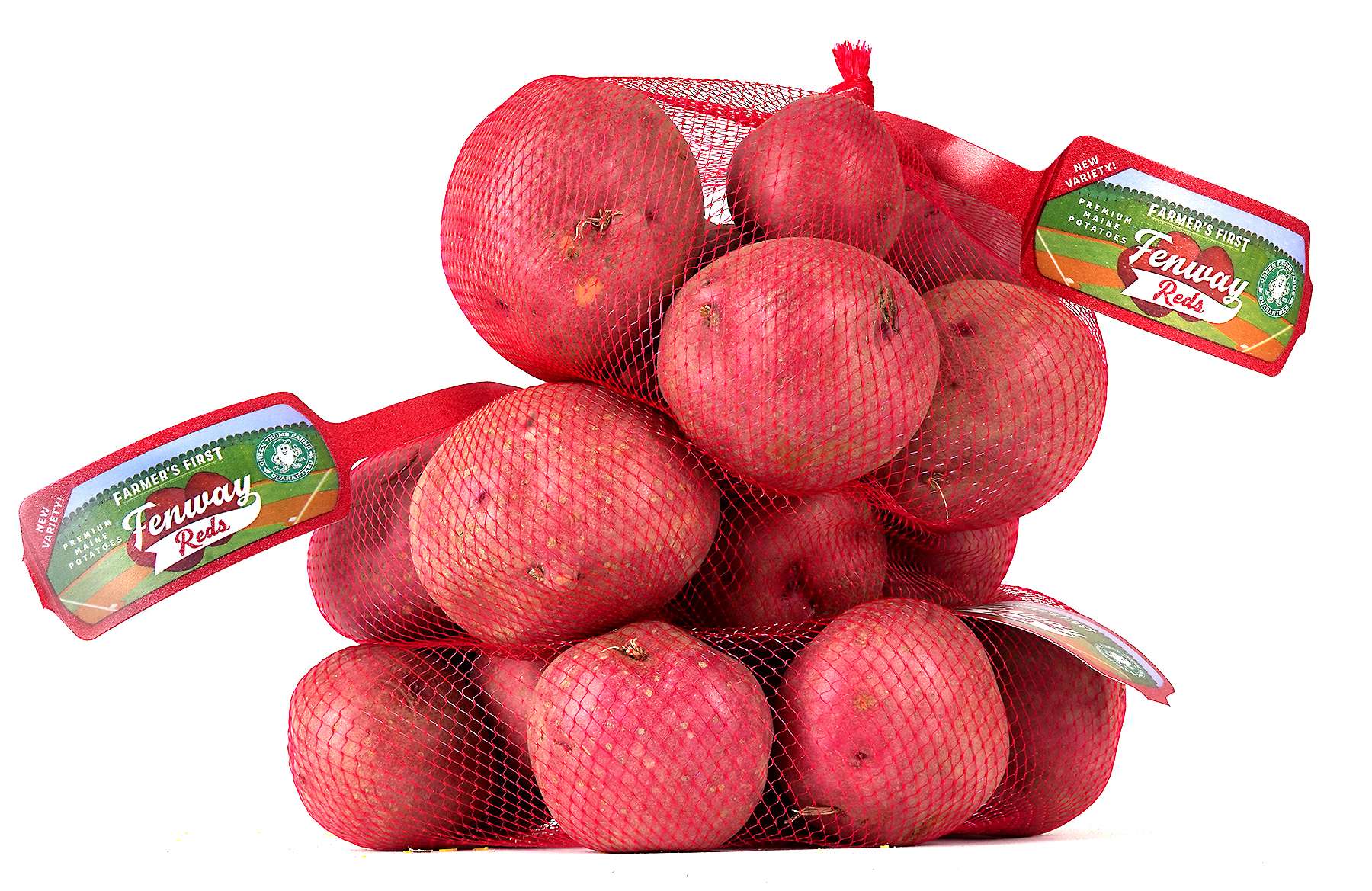 A bunch of round red potatoes in a mesh bag with a label that says Fenway Reds with a drawing of Fenway Park on it