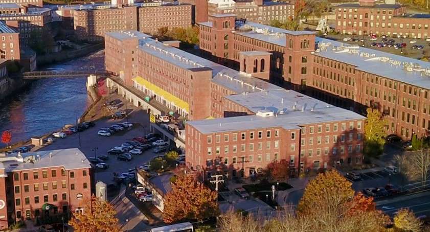 an overhead view of a complex of mill buildings