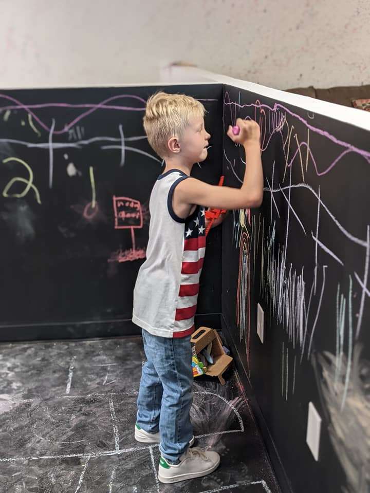 person with chalk