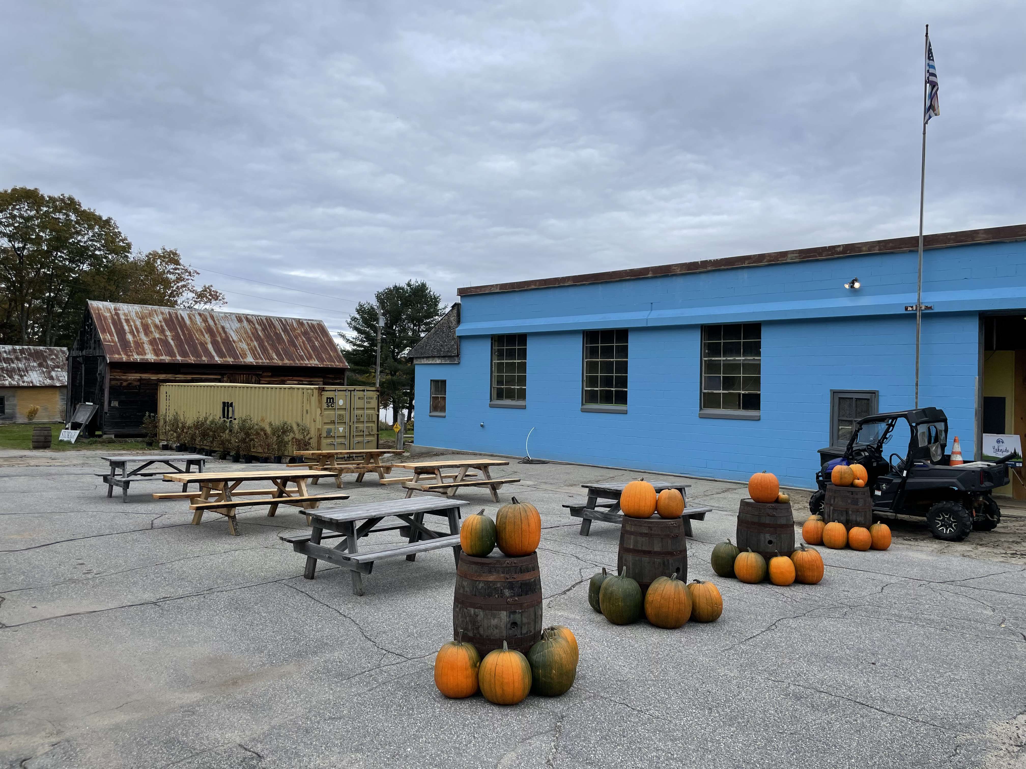 blue building exterior with pumpkins
