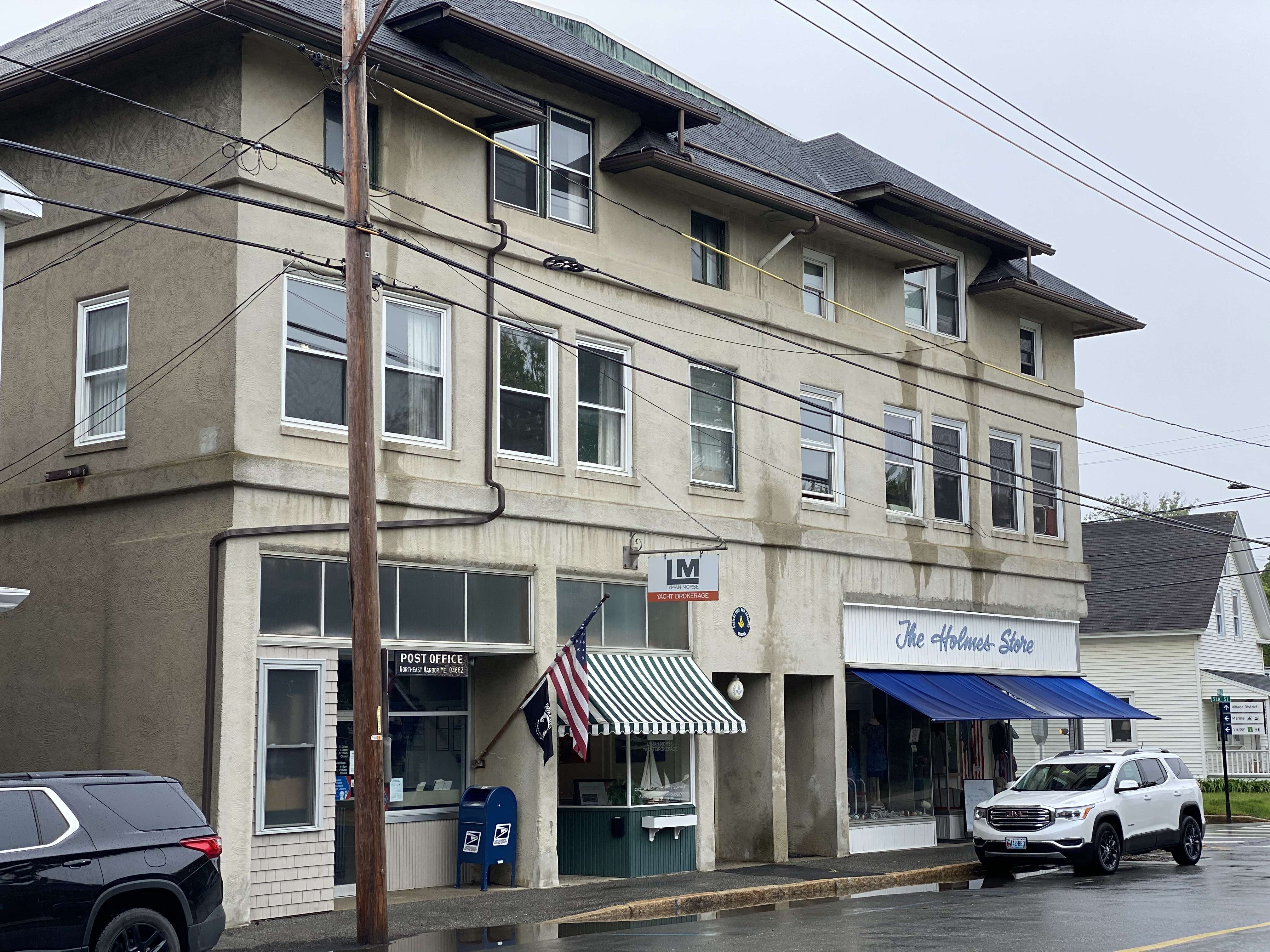 big building with post office and store