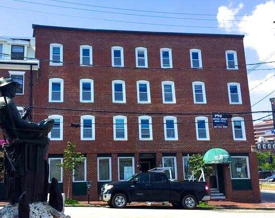 brick building and truck