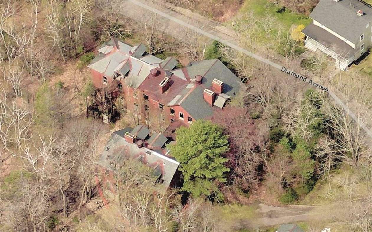 aerial view of crumbling brick building