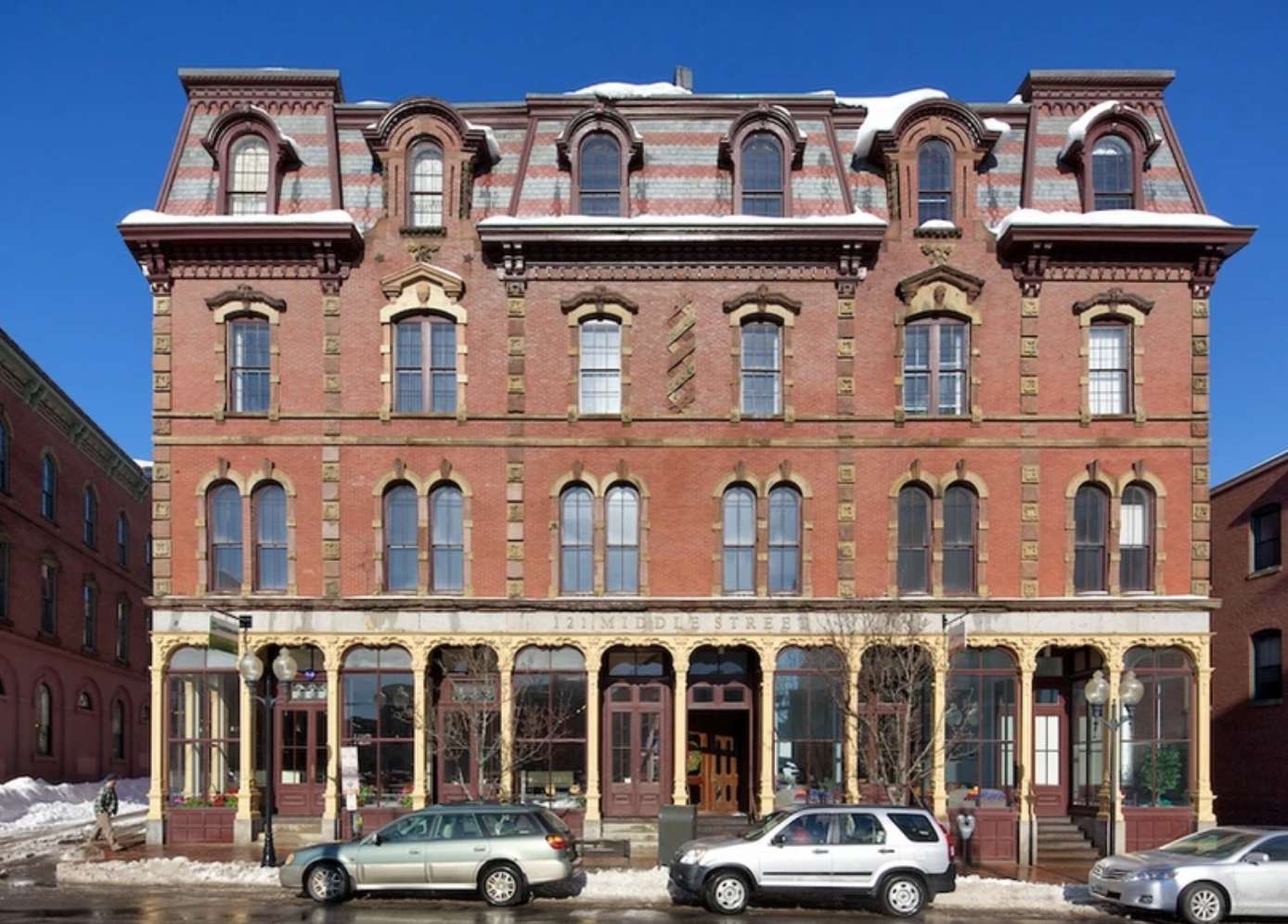 old building and cars