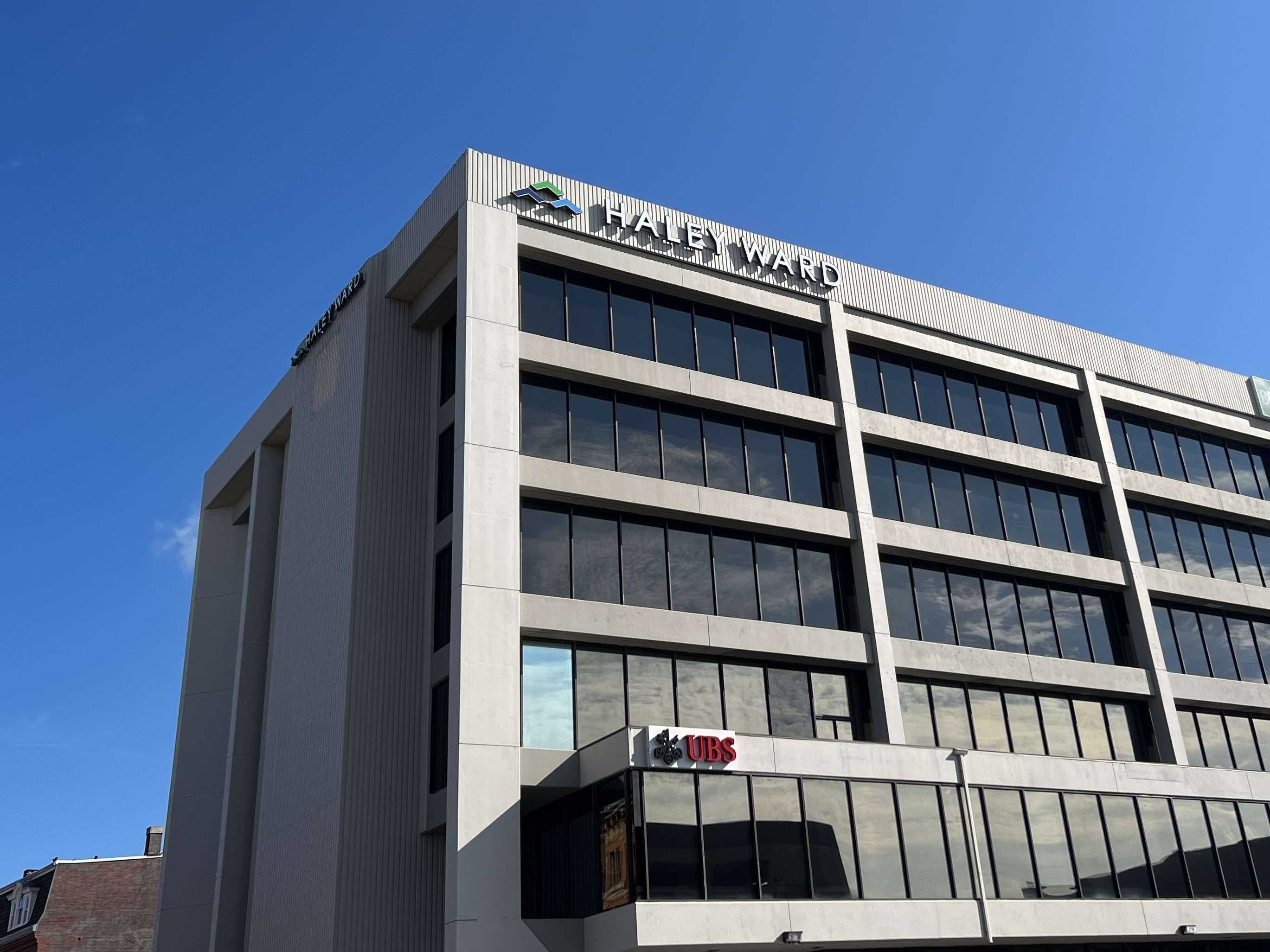 building with sky and sign