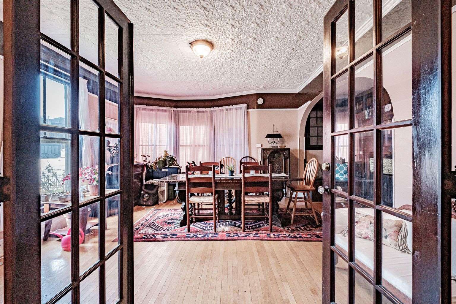 room with antiques and tin ceiling