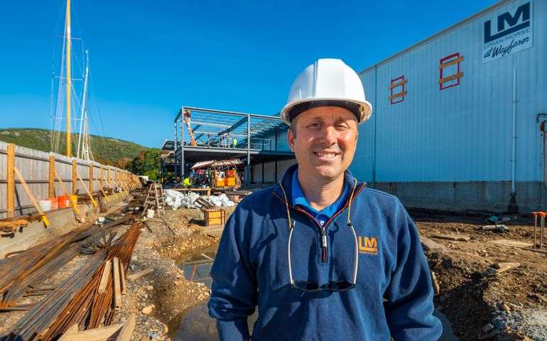 person at construction site wearing hardhat