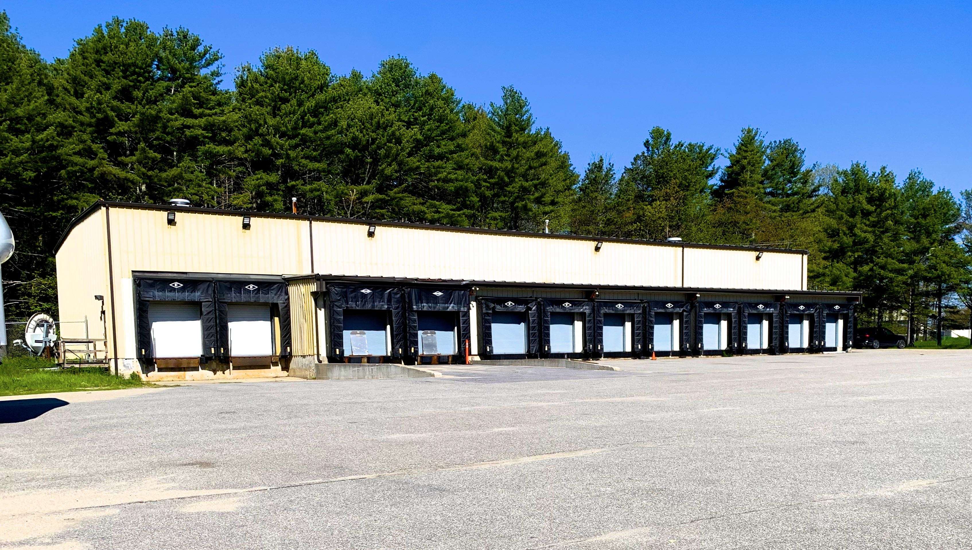 warehouse building and parking lot