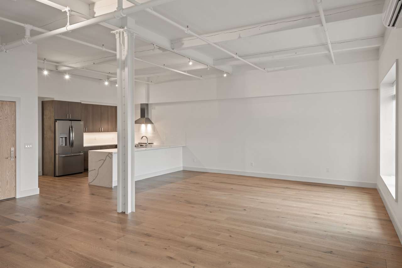 empty apartment with wood floors