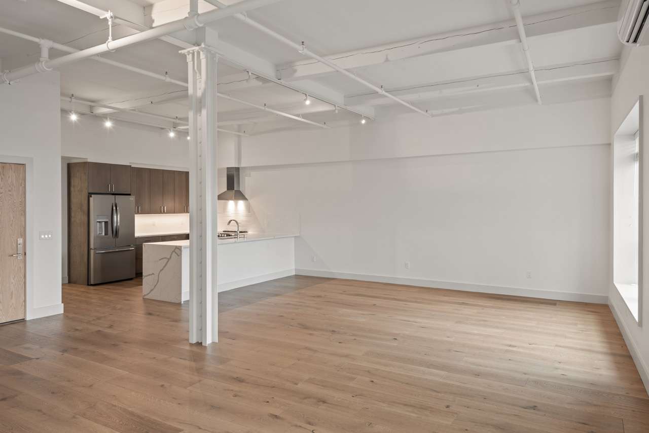 empty apartment with wood floors