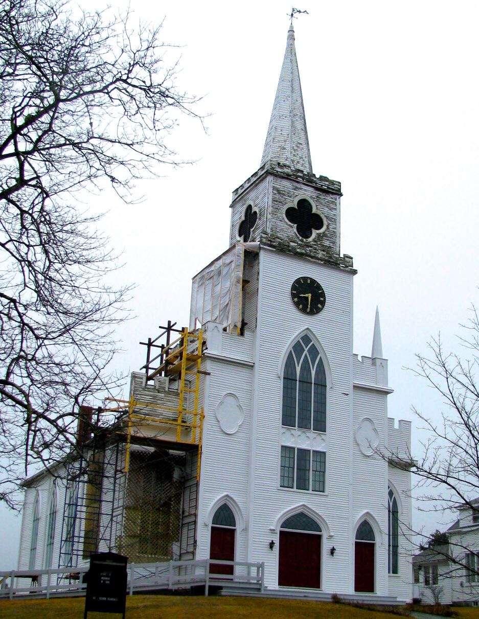 dilapidated church with scaffolding