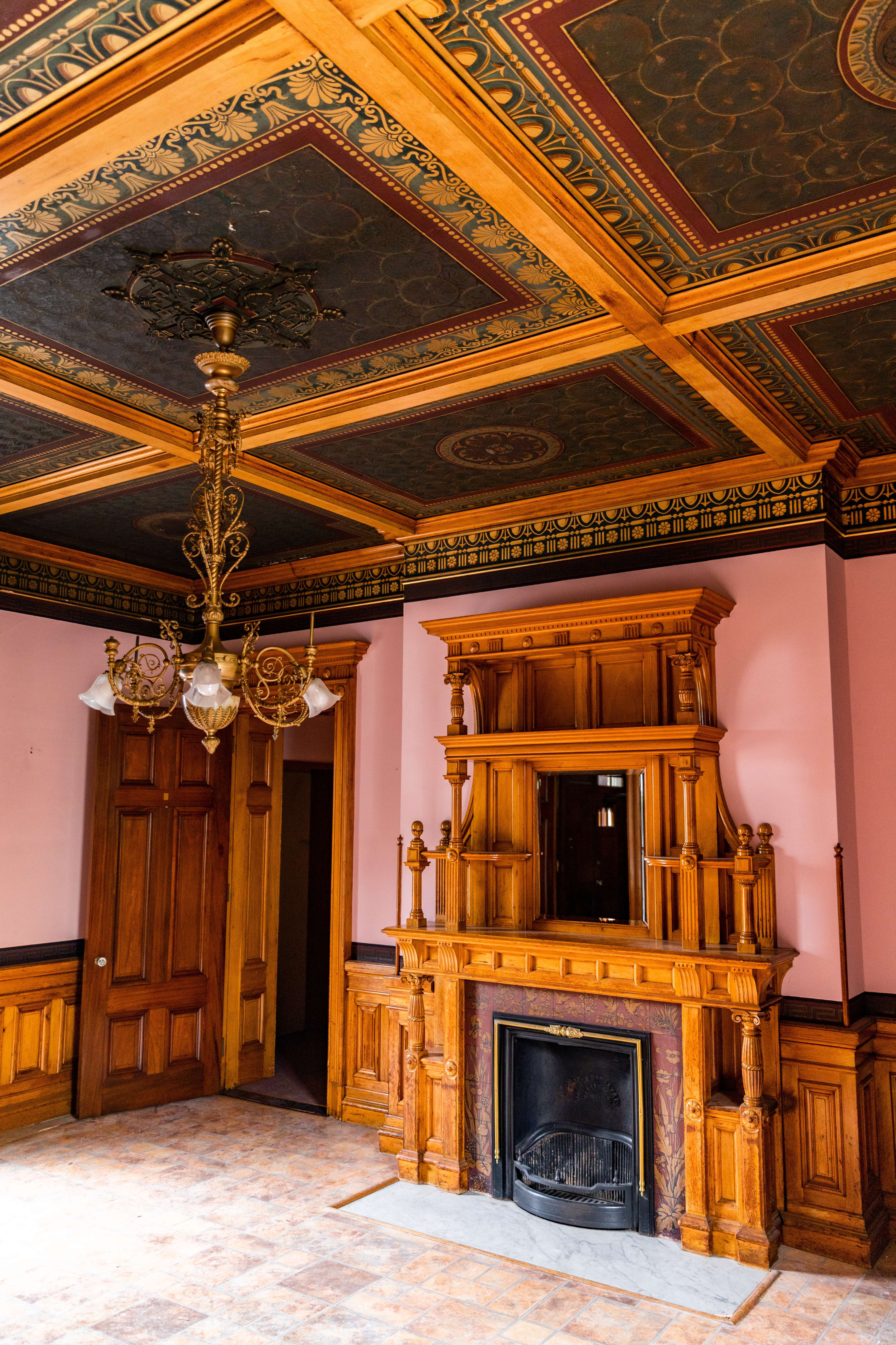 ornate ceiling and fireplace