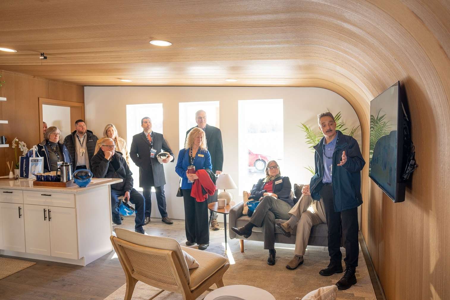 people inside round edged house