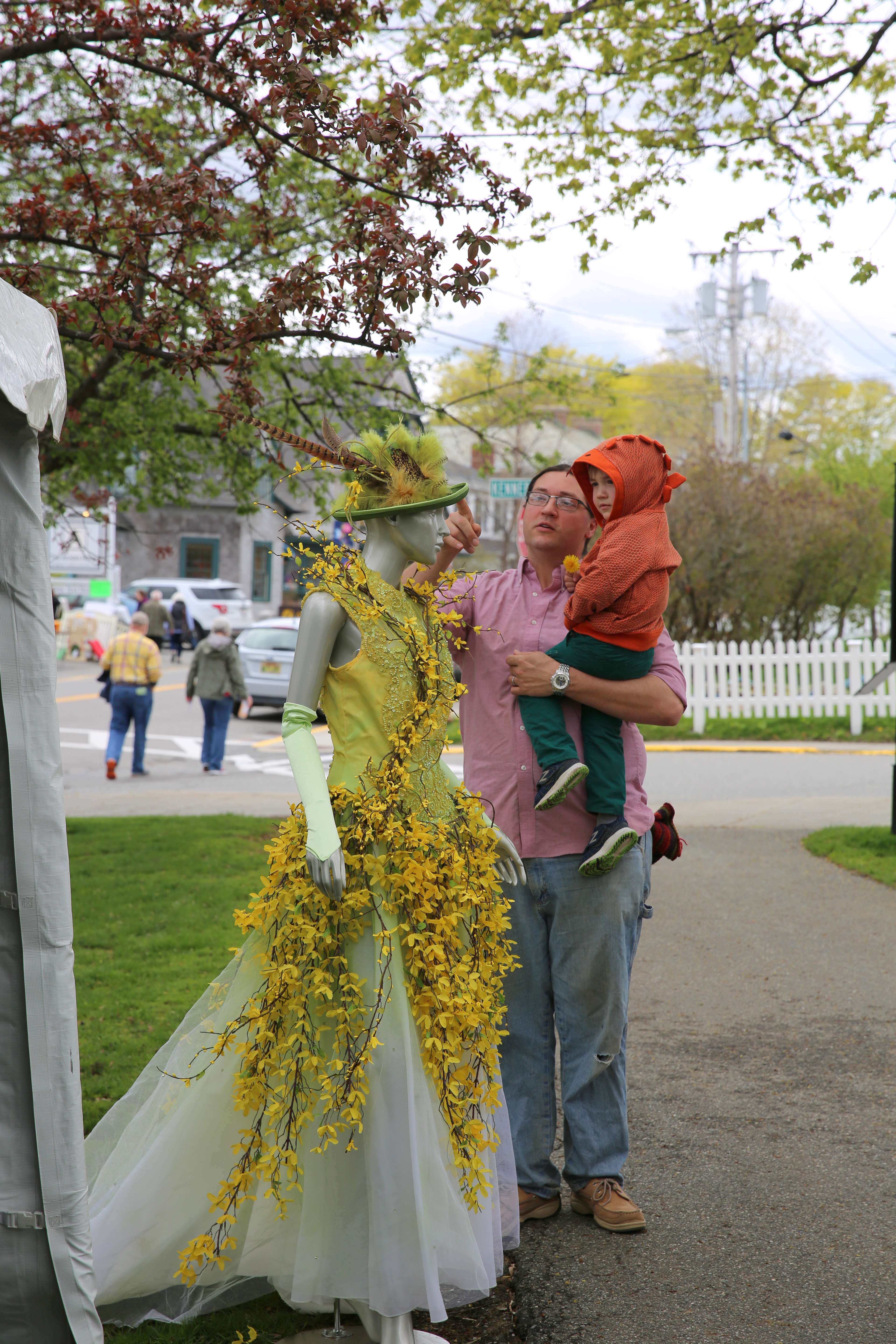 people with dress with flowers