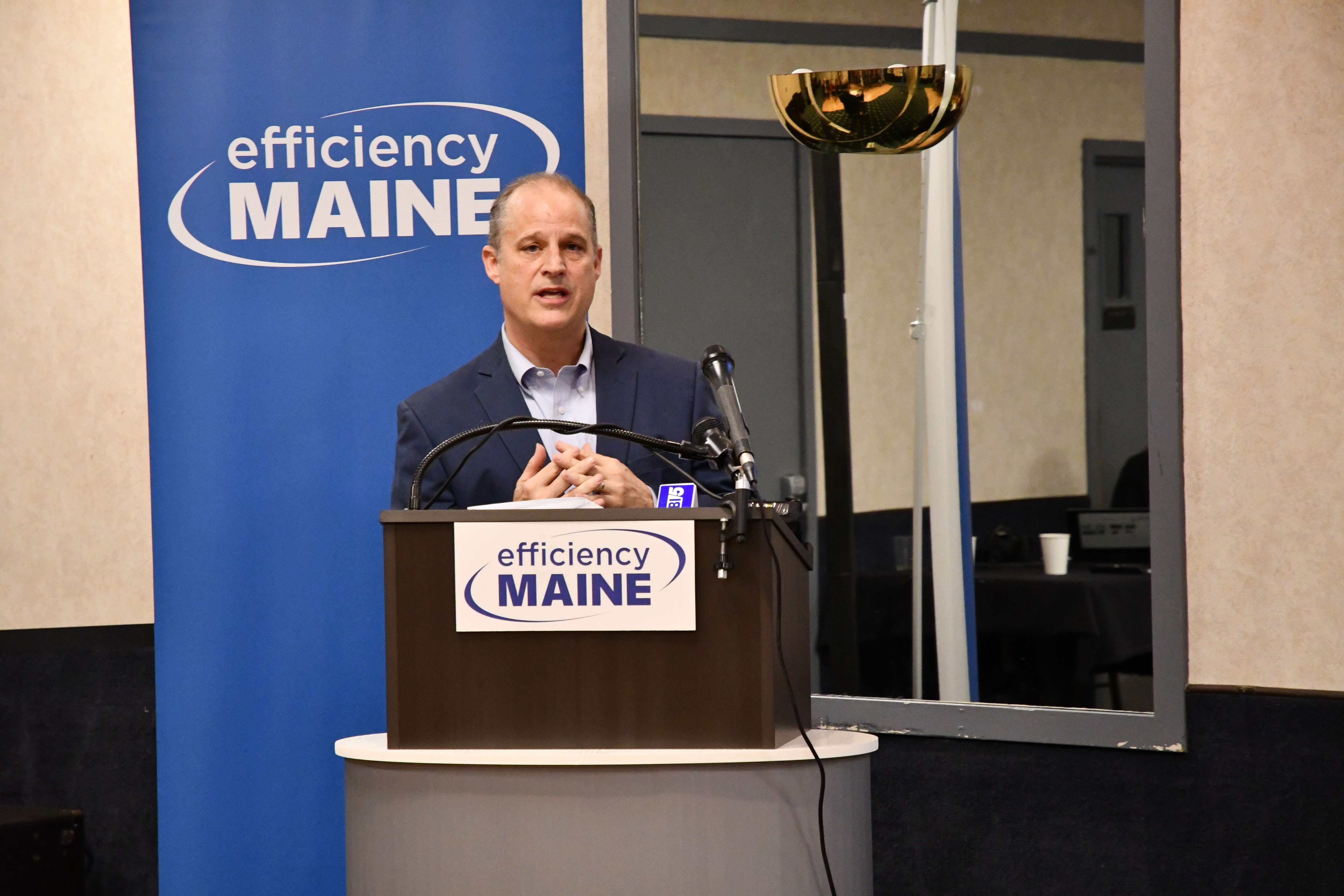 person talking at podium