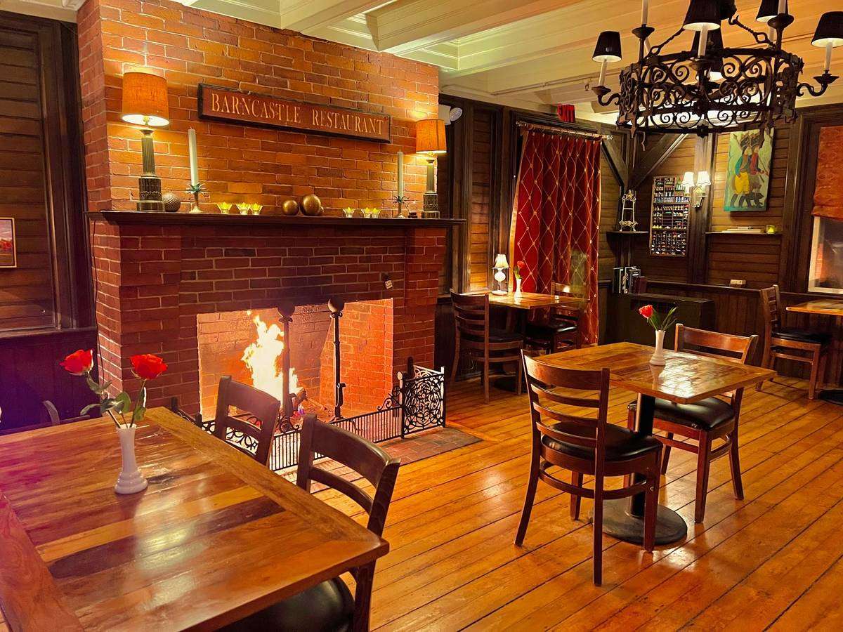 brick fireplace in dining room