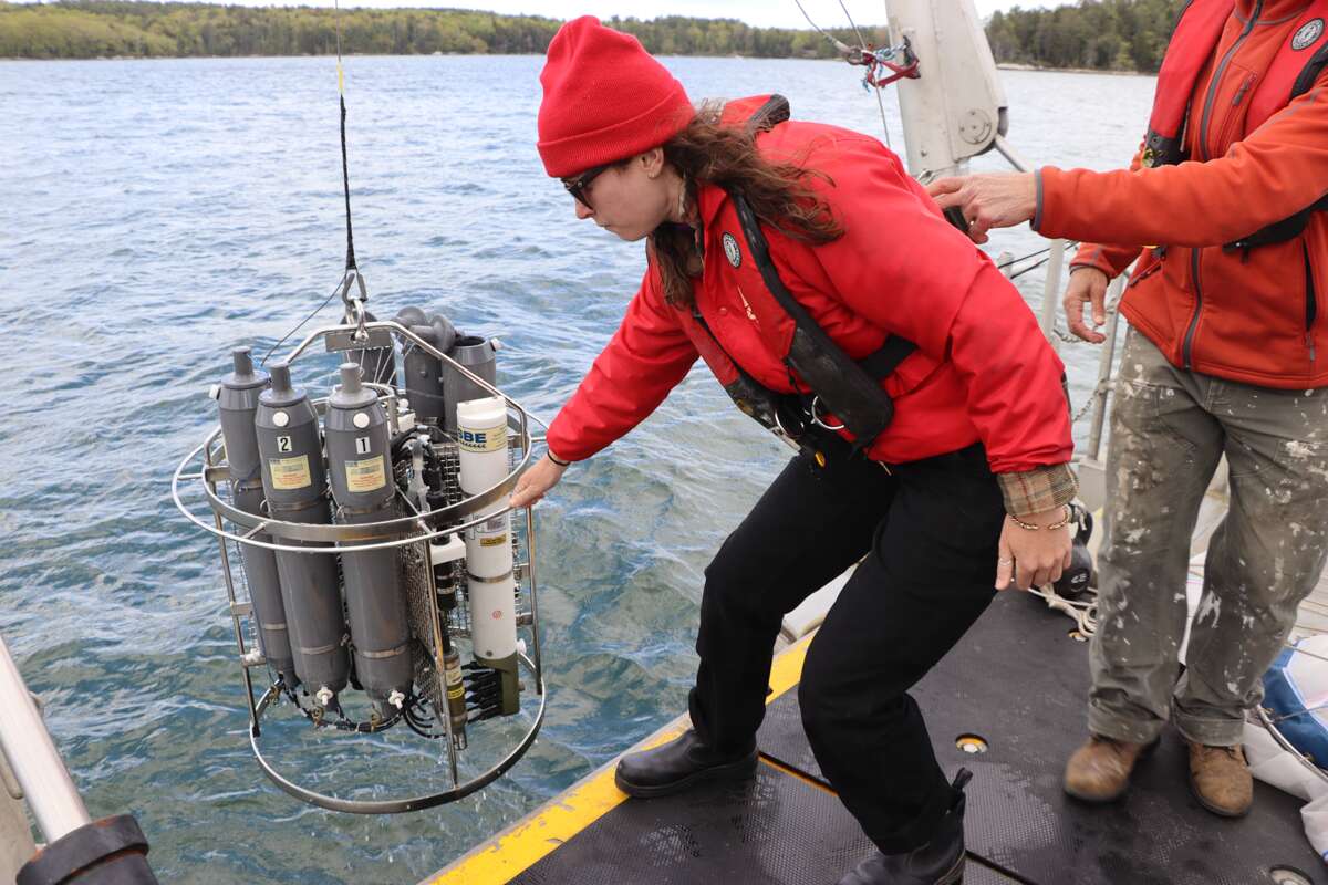 people with research gear on the water