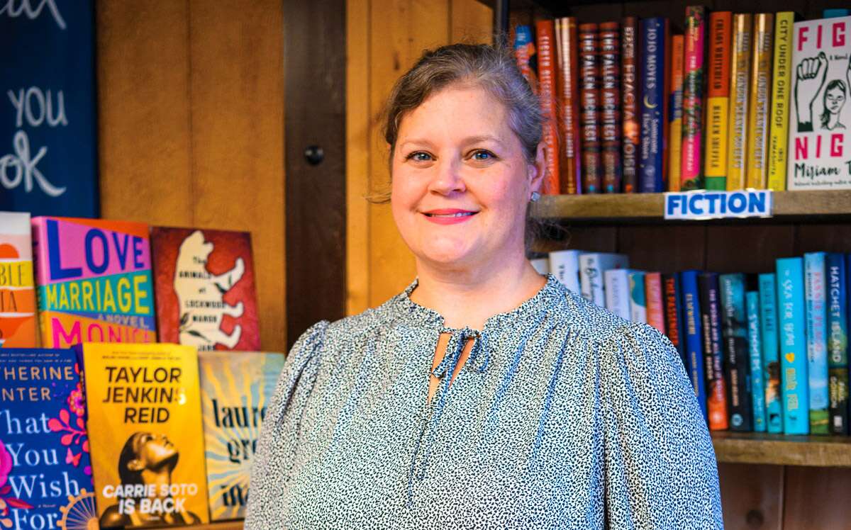 Woman standing in bookstore 