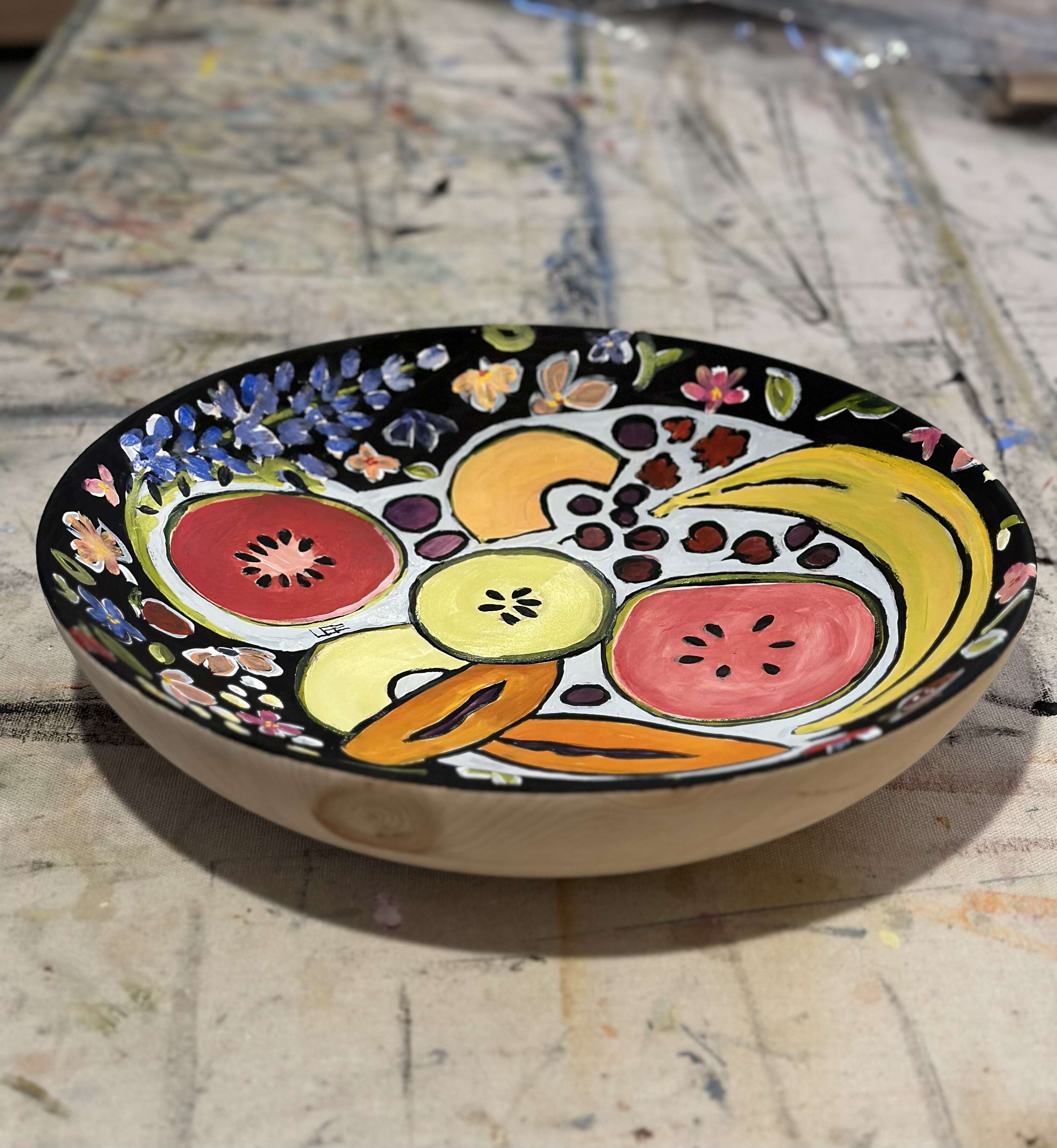 bowl painted with pictures of fruit