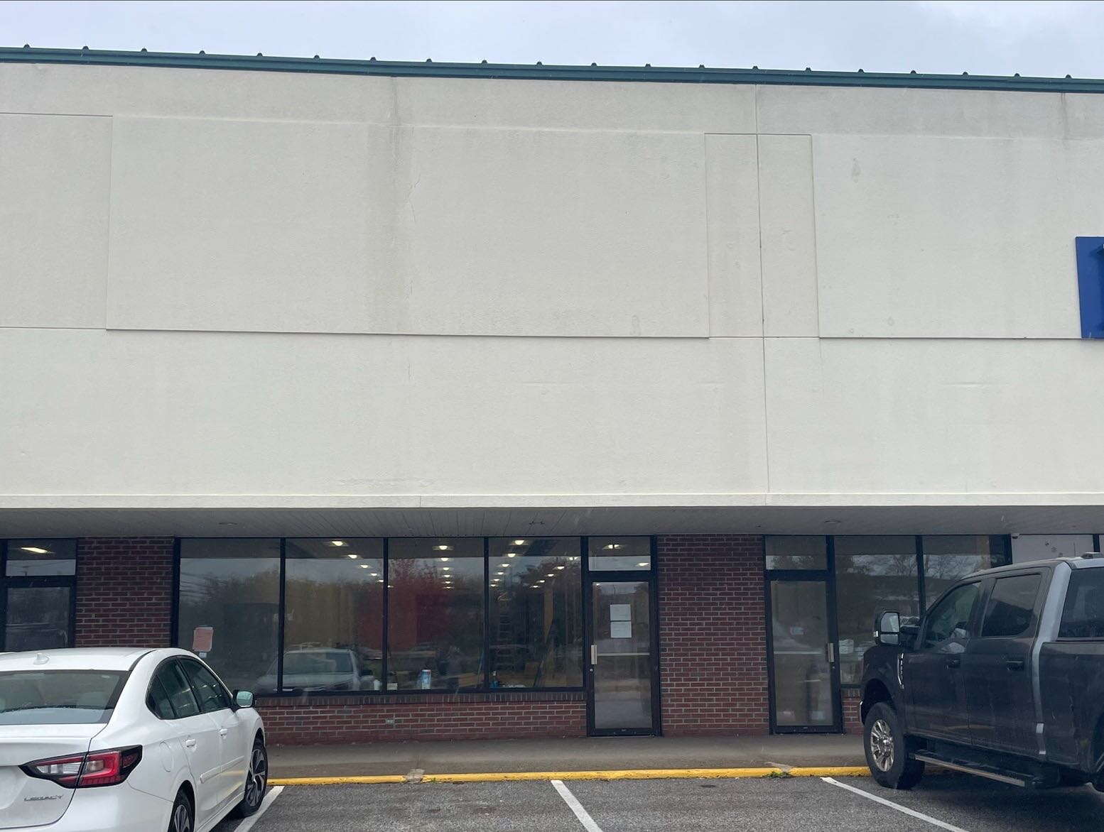 building exterior and vehicles