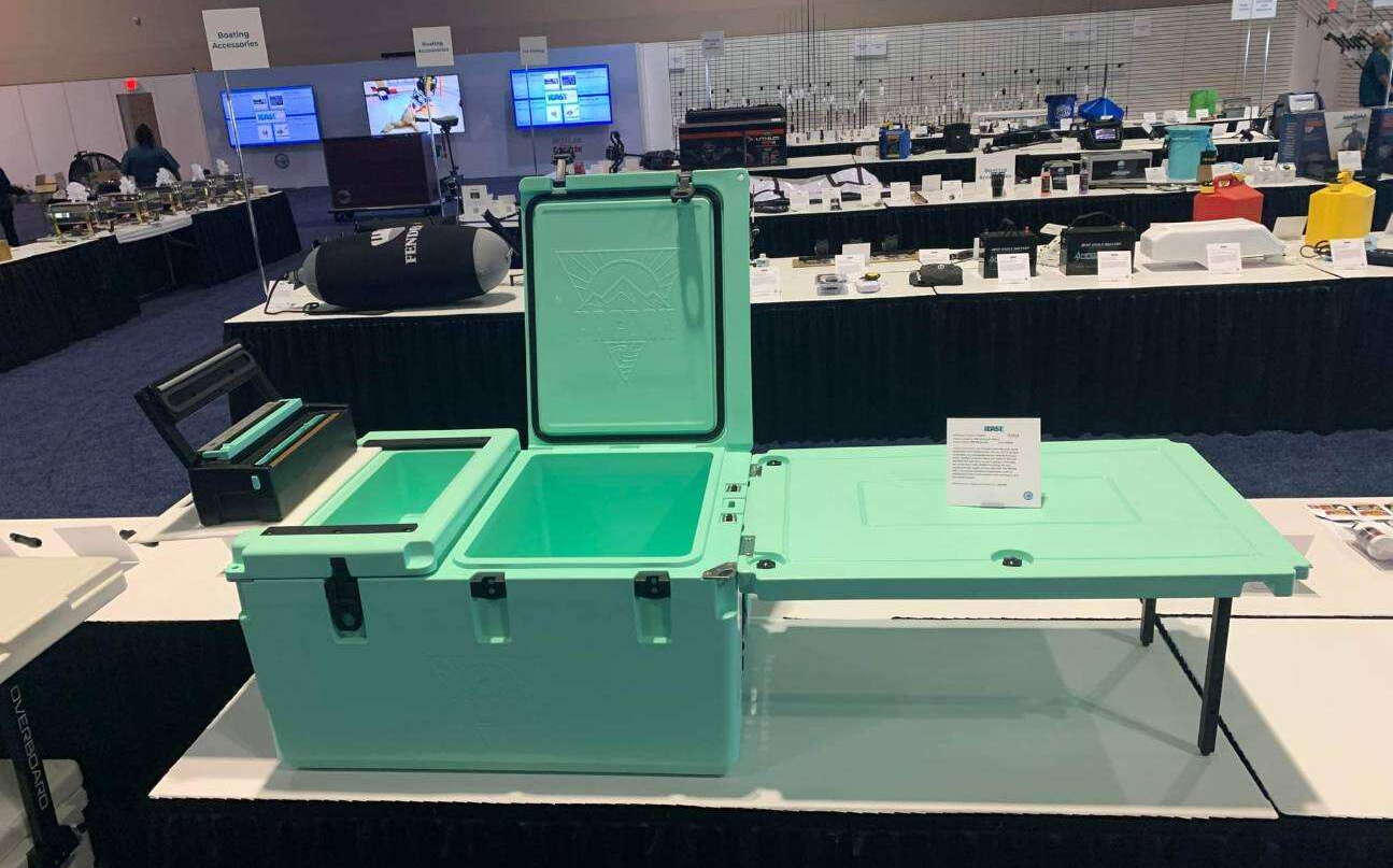 green cooler on table in room