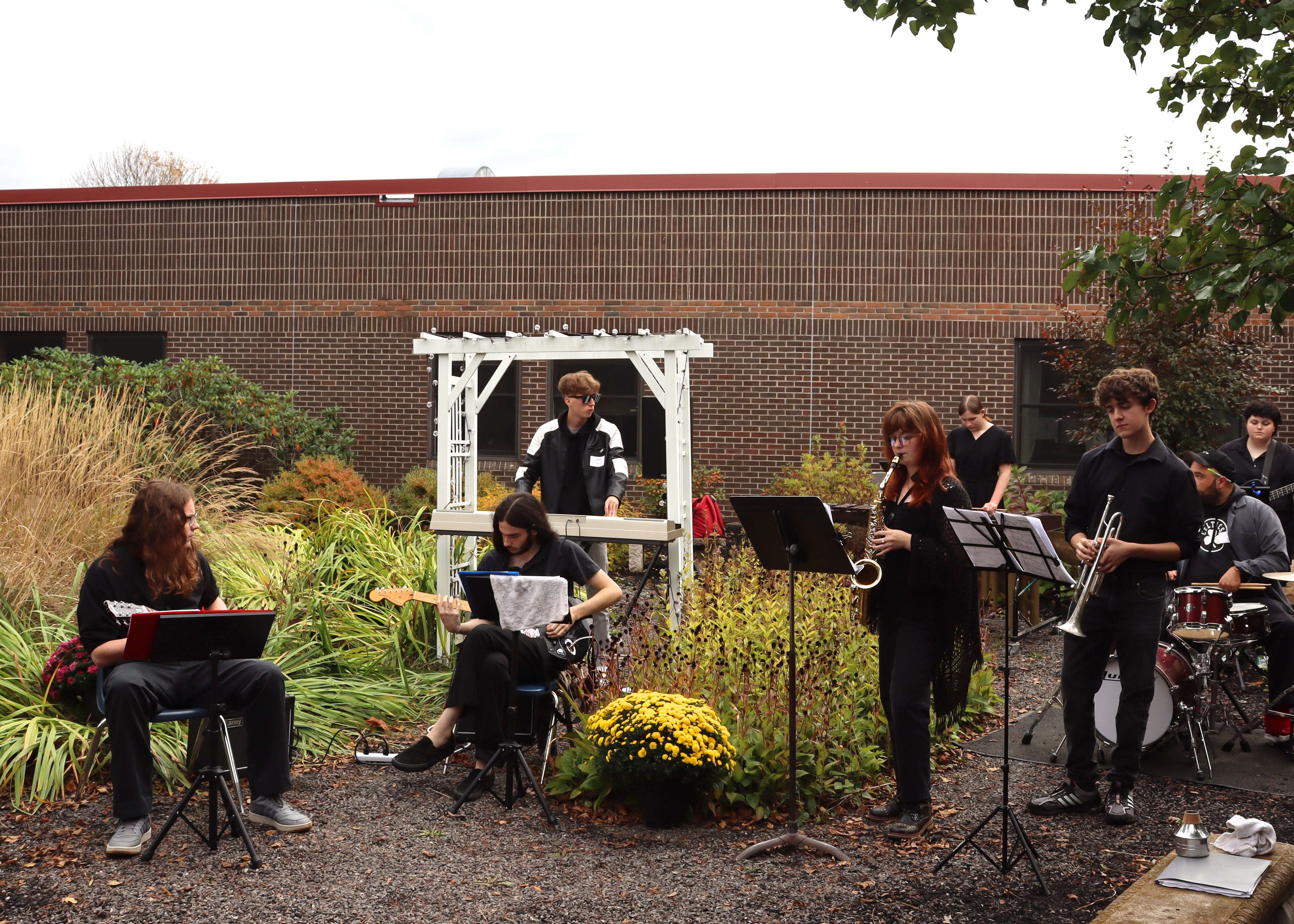 people playing instruments outside