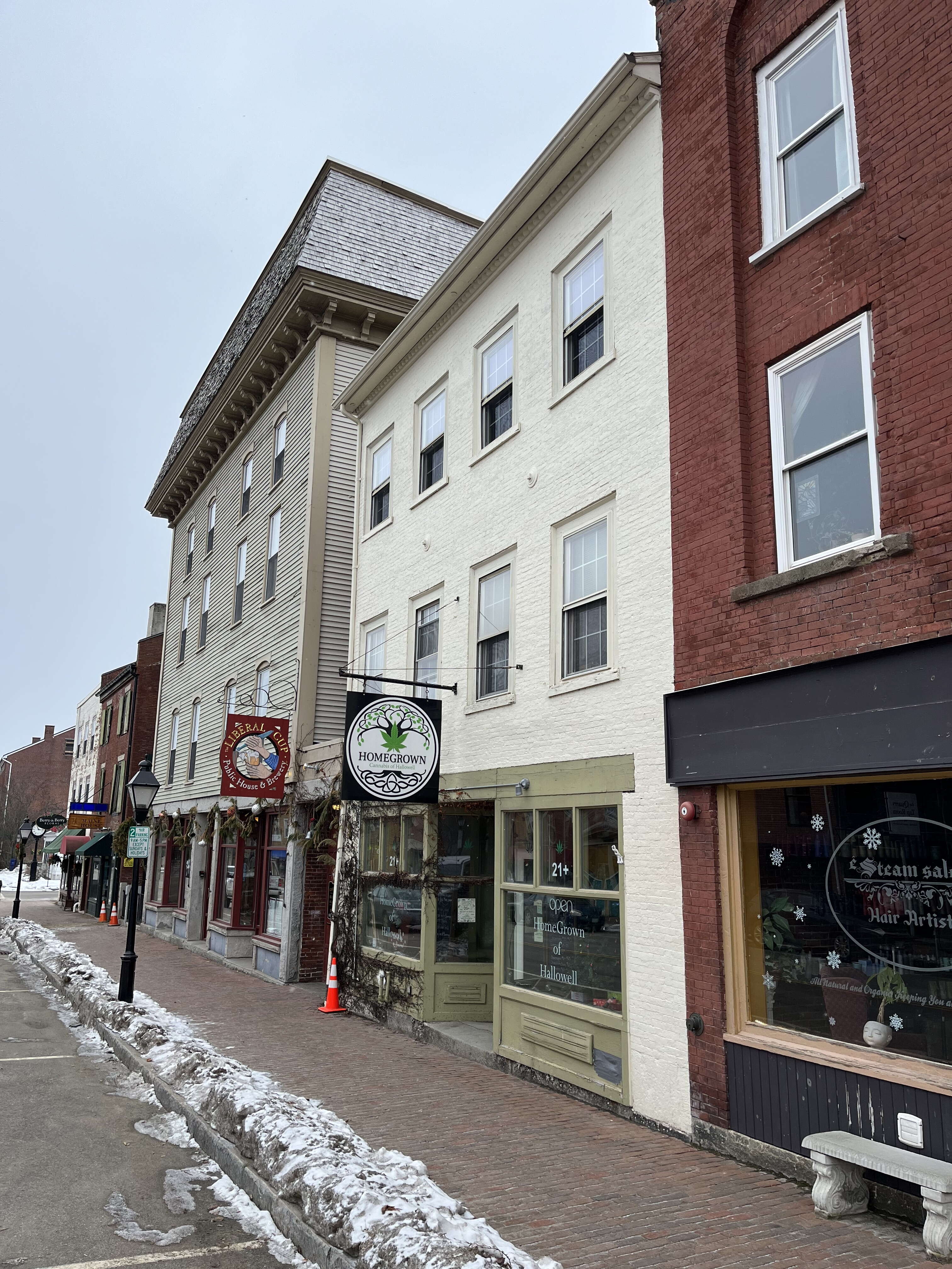 buildings and sidewalk with snow