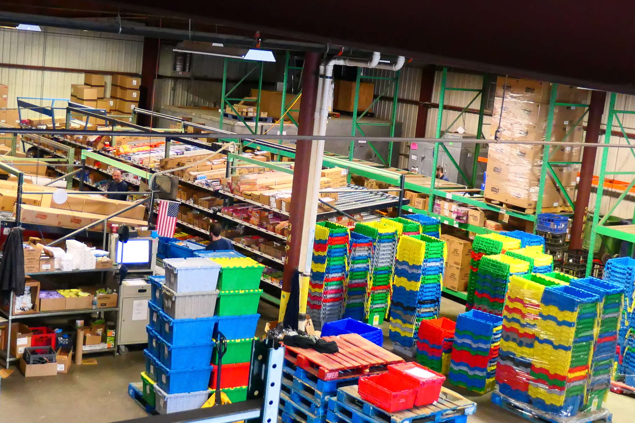 aerial of shelves and crates in big space
