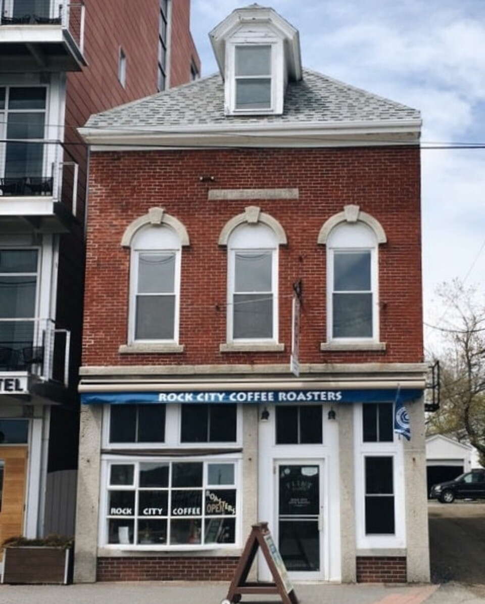 brick buildng with signs