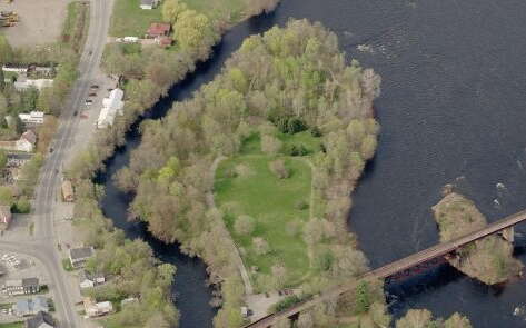 aerial view of woods and water