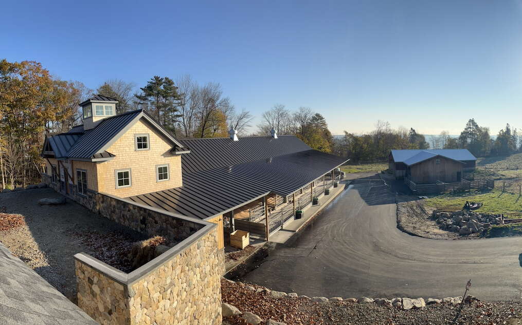 aerial view of buildings and field