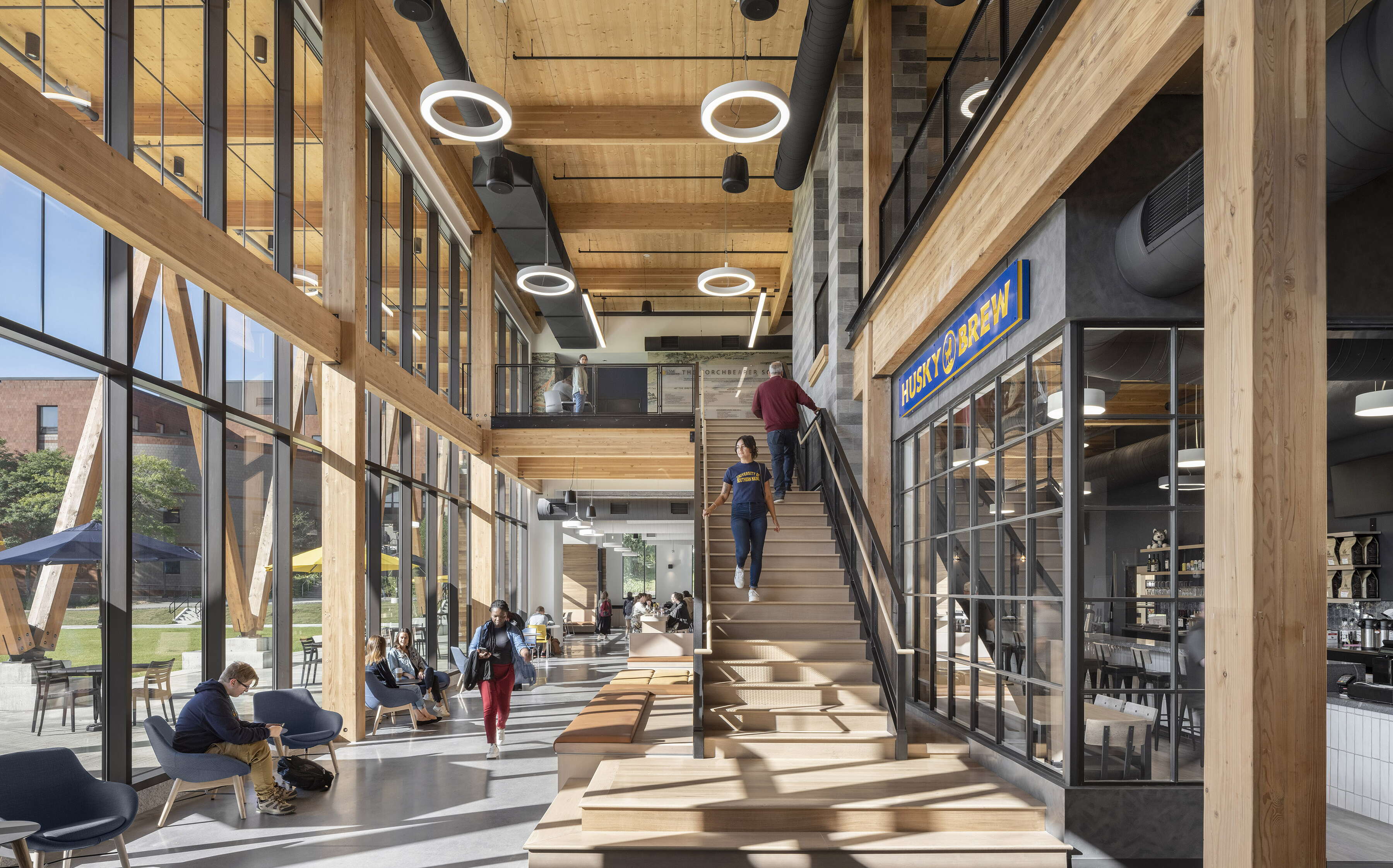 rendering of hallway and staircase with people