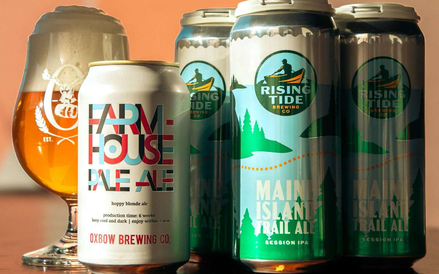 Beer cans and a glass.
