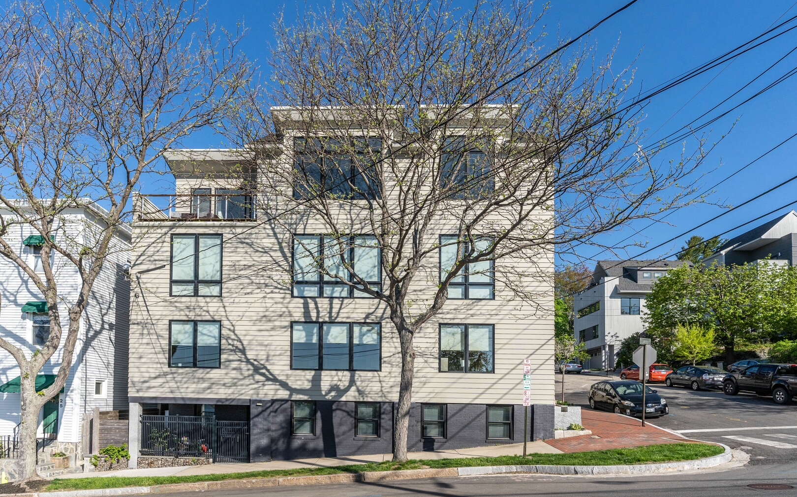 Exerior of a building with a tree.
