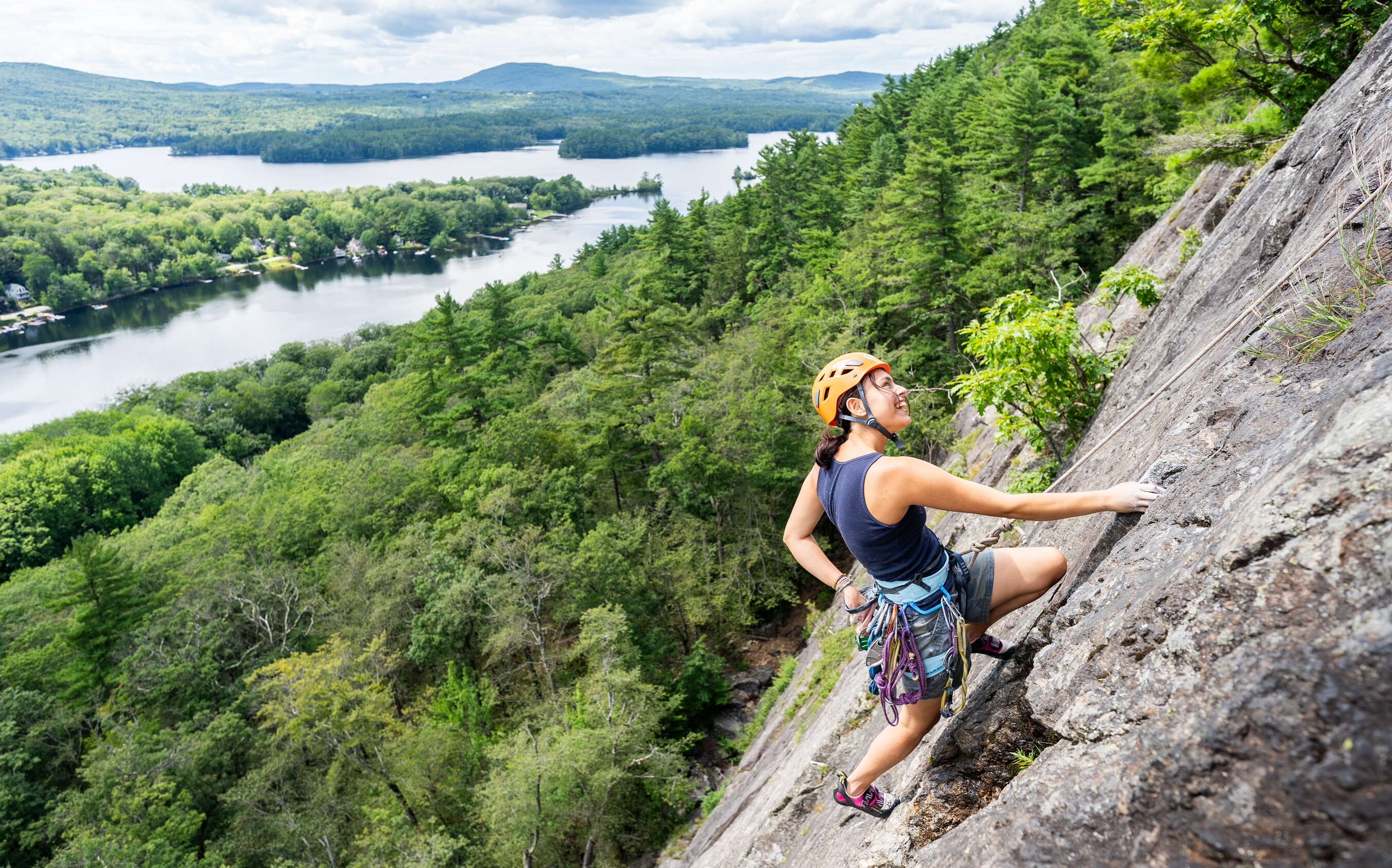 A person is climbing a rockface.