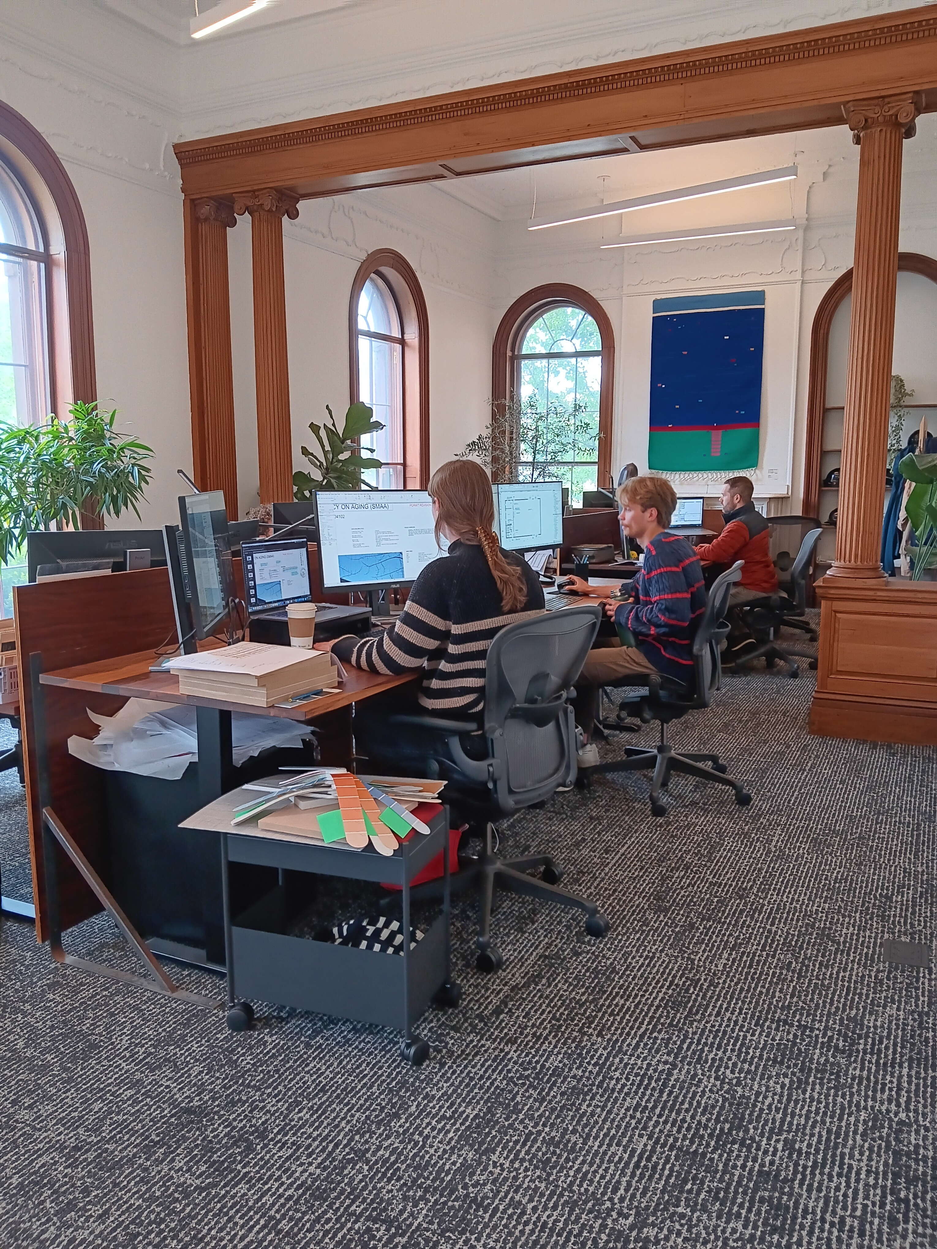 people at computer desks