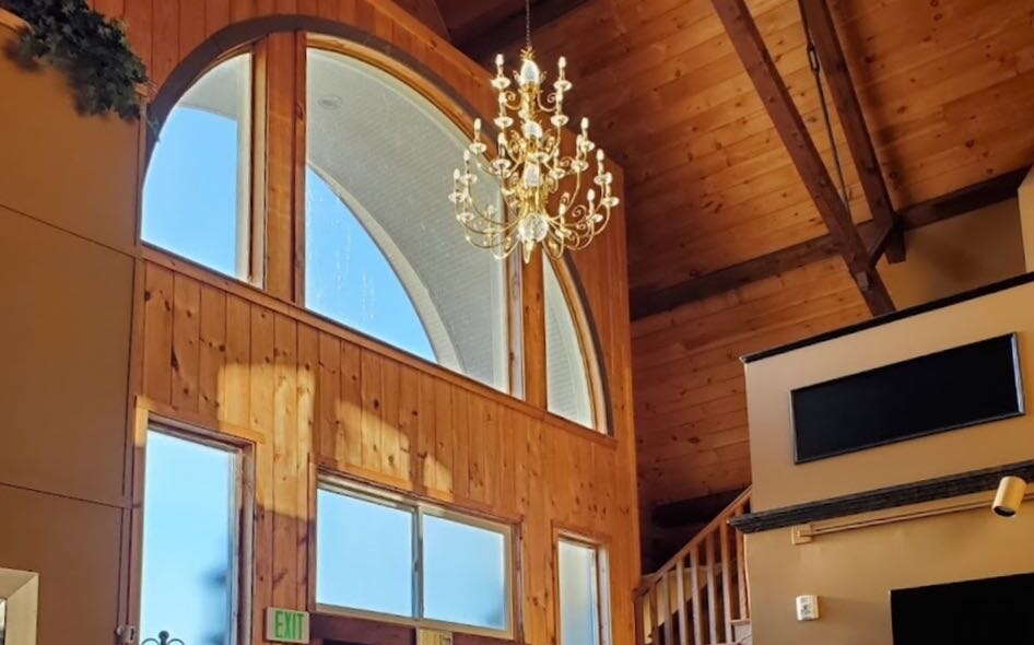 A room has a high ceiling.