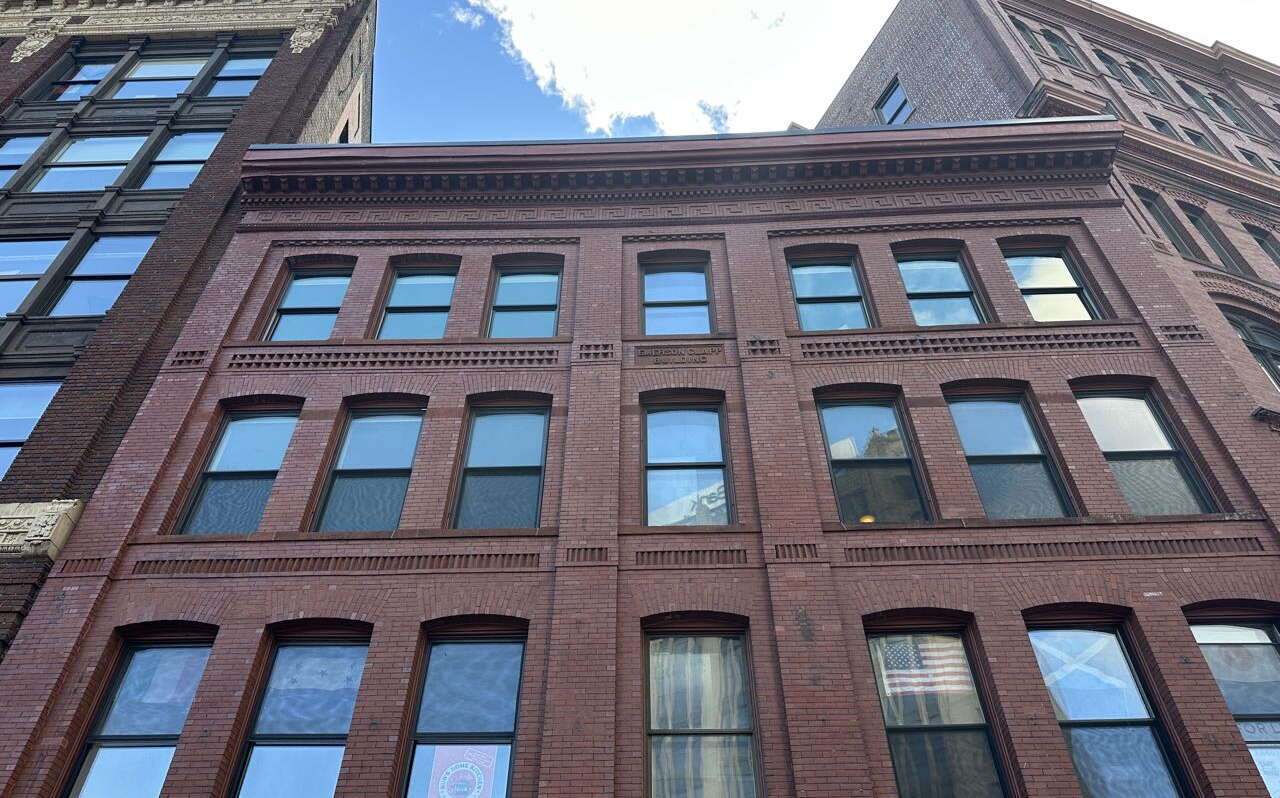 A view looking upward at the exterior of a building.