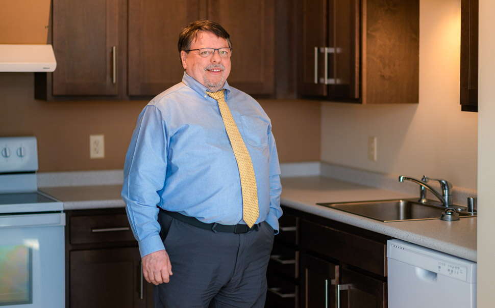 Glen Holmes in model unit in Auburn.