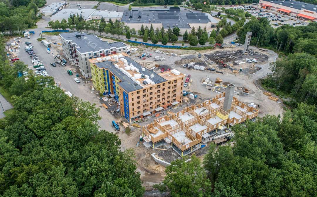 Building Business Clarks Pond apartment complex to open first units