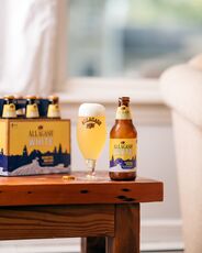 Allagash White beer in a bottle, glass and six-pack