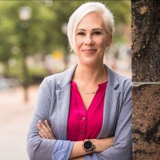 person posed with tree