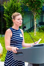 Woman at lectern 