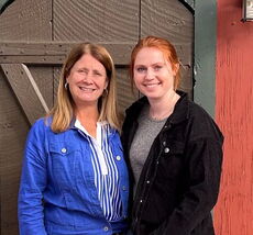 two people in front of brown door