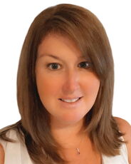 A person poses for a headshot.